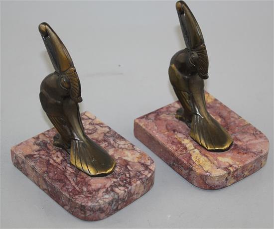 A pair of heron bookends & pair toucan bookends